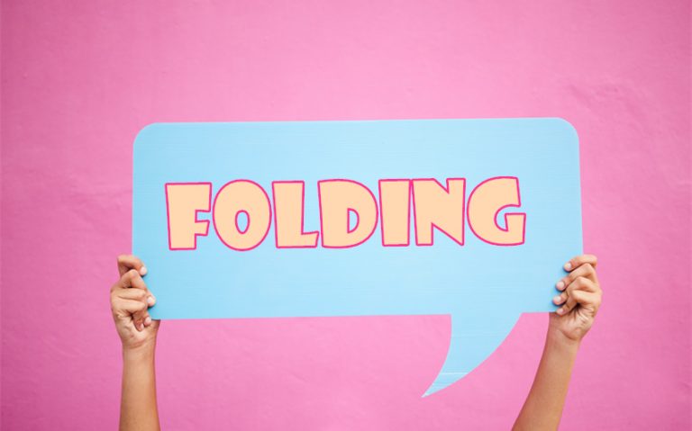 What Does Folding Mean in Slang: 5 Examples to Know